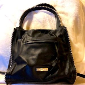 Black leather studded handbag